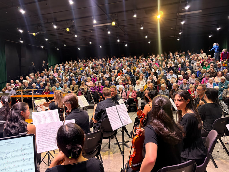 The New Zealand Doctors Orchestra performing to a full audience